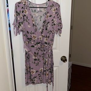 Never worn, lavender dress, bow tie sleeves, elastic back, attached belt.